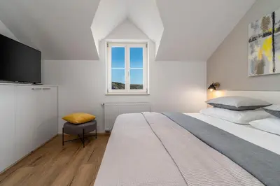Krevet ili kreveti u jedinici u objektu Villa Ani! Traditional and luxurious 4-bedroom villa with heated pool and sea views