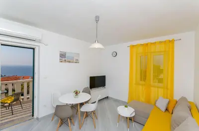 TV i/ili zabavni centar u objektu Apartments Marina