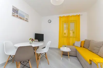 TV i/ili zabavni centar u objektu Apartments Marina