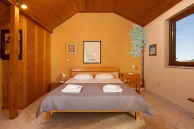 Krevet ili kreveti u jedinici u objektu Holiday House Omi