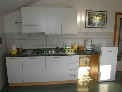 Kuhinja ili čajna kuhinja u objektu 3416-3 Apartment in Bol with sea view, balcony, air conditioning, WiFi