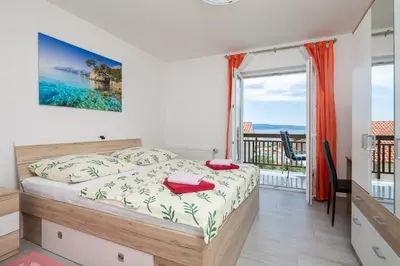 Krevet ili kreveti u jedinici u objektu Paramount Apartments