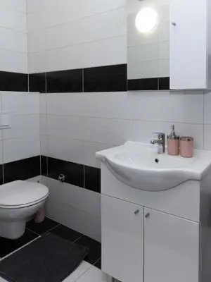 Kupaonica u objektu Sunny Hill Apartments with rooftop pool