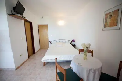 TV i/ili zabavni centar u objektu Studio Apartment in Duce with sea view, Balcony, Klimaanlage, WLAN 132-1