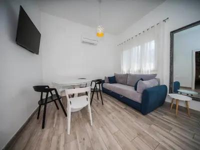 TV i/ili zabavni centar u objektu Holiday Home Relax