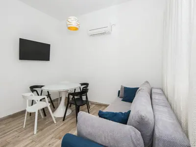 TV i/ili zabavni centar u objektu Holiday Home Relax