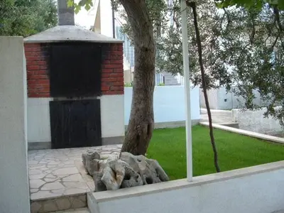 Vrt u objektu Apartment in Duce with sea view, terrace, air conditioning, WiFi 3423-1