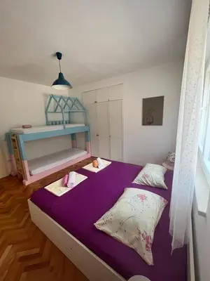 Krevet ili kreveti u jedinici u objektu Family apartment near sea
