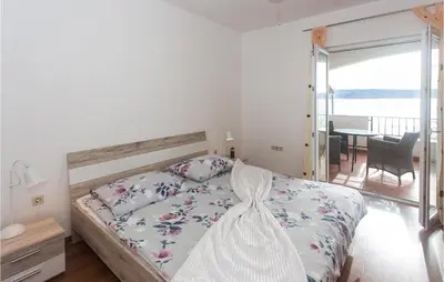 Krevet ili kreveti u jedinici u objektu Cozy Apartment In Suhi Potok, Jesenice