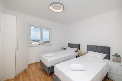 Krevet ili kreveti u jedinici u objektu LuSi Apartman Makarska