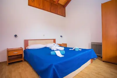 Krevet ili kreveti u jedinici u objektu CHEAP APARTMENT near OMIŠ