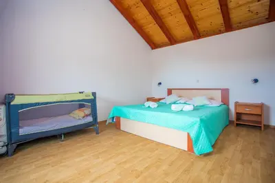 Krevet ili kreveti u jedinici u objektu CHEAP APARTMENT near OMIŠ
