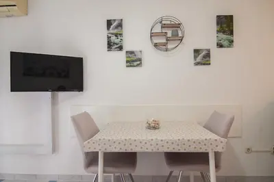 TV i/ili zabavni centar u objektu Aurora Apartments