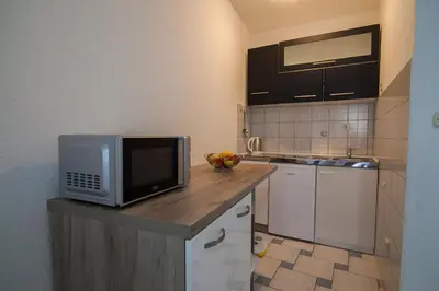 Kuhinja ili čajna kuhinja u objektu Aurora Apartments