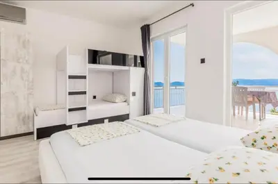 Krevet ili kreveti u jedinici u objektu Ivana Black & White Apartments - Marusici