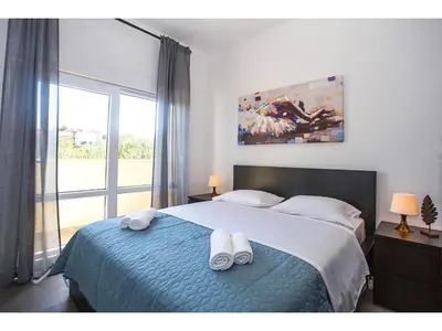 Krevet ili kreveti u jedinici u objektu Olive Tree Apartments
