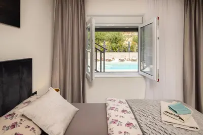 Krevet ili kreveti u jedinici u objektu Luxury Apartment Lorena - Private Heated Pool -