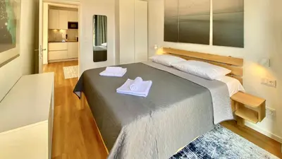 Krevet ili kreveti u jedinici u objektu Nautilus-Bay Suites - Zweizimmer-Suite 411