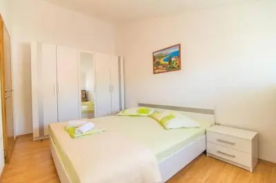 Krevet ili kreveti u jedinici u objektu Apartment in Dugi Rat with sea view, terrace, air conditioning, WiFi 5113-4