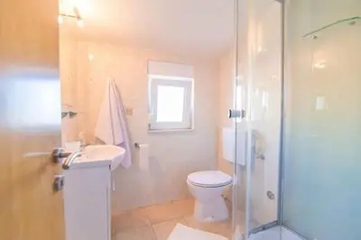Kupaonica u objektu Apartment in Dugi Rat with sea view, terrace, air conditioning, WiFi 5113-4