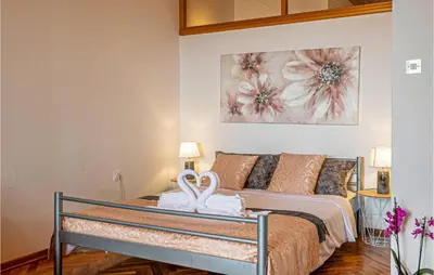 Krevet ili kreveti u jedinici u objektu 1 Bedroom Beach Front Apartment In Podstrana