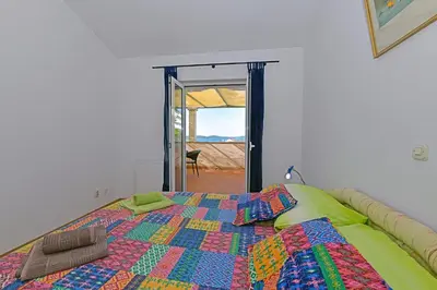 Krevet ili kreveti u jedinici u objektu Apartments Biba Hvar