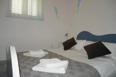 Krevet ili kreveti u jedinici u objektu Apartment in Dugi Rat with sea view, balcony, air conditioning, WiFi 5132-4