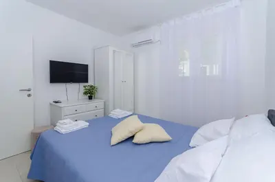 Krevet ili kreveti u jedinici u objektu Apartments Pleasures
