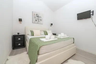 Krevet ili kreveti u jedinici u objektu Penthouse Apartment Villa Danijela with Jacuzzi
