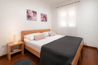 Krevet ili kreveti u jedinici u objektu Azalea Apartments