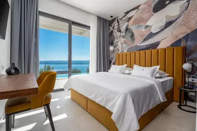 Krevet ili kreveti u jedinici u objektu Luxury Villa Andoris with Gym, Spa, Heated pool