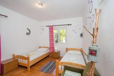 Krevet ili kreveti u jedinici u objektu Apartments by the sea Cove Zarace, Hvar - 20924
