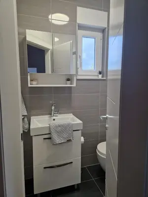 Kupaonica u objektu Apartman River Breeze