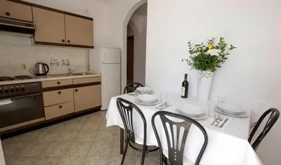 Kuhinja ili čajna kuhinja u objektu Apartment in Duce with sea view, balcony, air conditioning, WiFi 5146-6