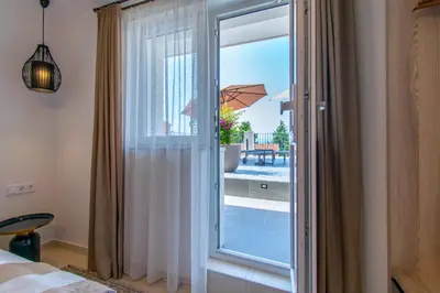 Krevet ili kreveti u jedinici u objektu Baška Voda Naputica 34 (Apartman Nikola)
