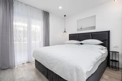 Krevet ili kreveti u jedinici u objektu Apartmani Marko