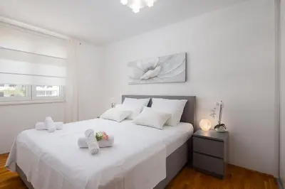 Krevet ili kreveti u jedinici u objektu Comfortable Penthouse Apartment - Sita