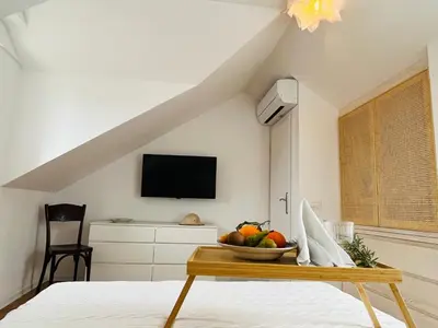 TV i/ili zabavni centar u objektu House called Happiness