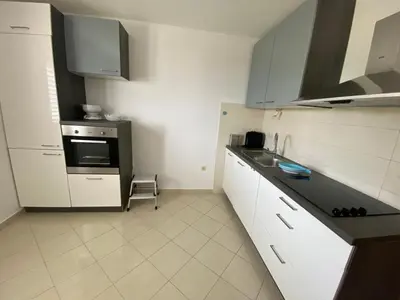 Kuhinja ili čajna kuhinja u objektu Panorama Apartment Jakov