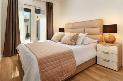 Krevet ili kreveti u jedinici u objektu Villa Stella, private pool, sleeps 12, Dugi Rat