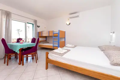 Krevet ili kreveti u jedinici u objektu Apartments and Room Jure