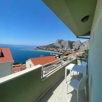 Apartments with parking space Omis - 21057